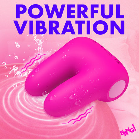 Bang Dual Silicone Clitoral Vibrator Pink showcasing powerful vibration in a water splash setting.