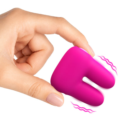 Hand holding the Bang Dual Silicone Clitoral Vibrator Pink, showcasing its soft silicone design and ergonomic shape.