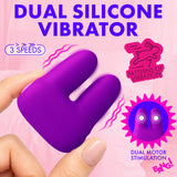 Hand holding a Dual Silicone Clitoral Vibrator Purple showcasing its design and features.