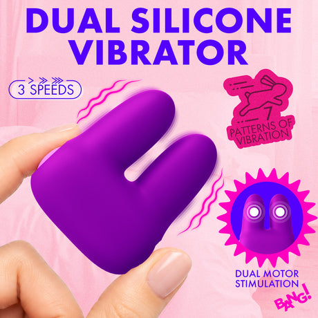 Hand holding a Dual Silicone Clitoral Vibrator Purple showcasing its design and features.