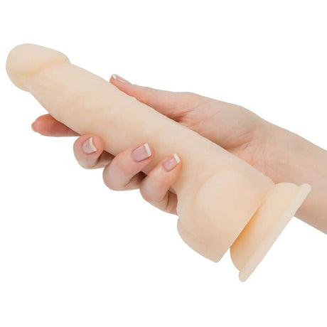 Naked Addiction Dual Density Dong Vanilla 8 Inch held in hand, showcasing realistic design and soft texture.