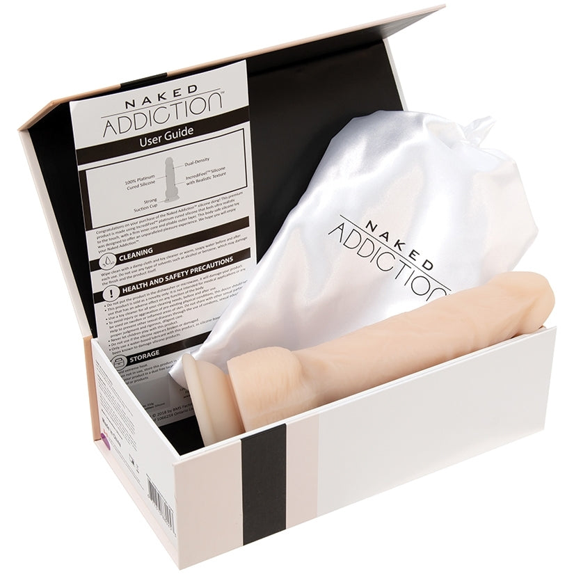 Naked Addiction Dual Density Dong Vanilla 8 Inch in box with user guide and storage bag.
