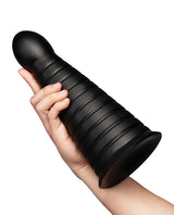 b-Vibe Cone 10 inch Tapered & Ribbed Dildo with Suction Cup held in hand, showcasing its textured design.
