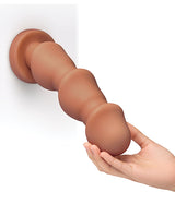 b-Vibe Headz 10.5 inch Multi-Bulb Dildo with Flared Base, showing hand holding the dildo with spaced bulbs on the shaft.