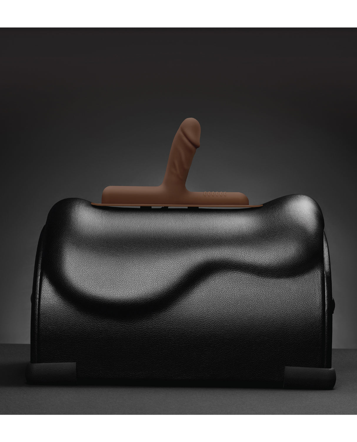 The Cowgirl Bronco Silicone Attachment Chocolate atop The Cowgirl Premium Sex Machine for realistic pleasure.