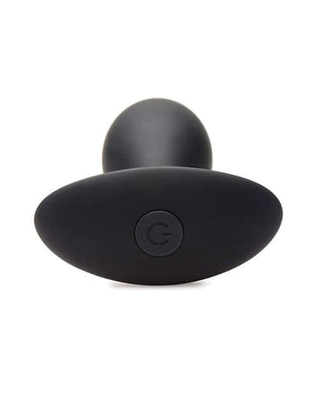 Rooster Rumbler Vibrating Silicone Anal Plug Large Black from a top view, showcasing its firm body and power button.