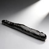 JOCK 13 Inch Tapered Double Dong Black on a smooth surface, showcasing its realistic detailing and dual heads.