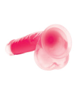 Lollicock 7 Inch Glow in the Dark Silicone Dildo Pink showcasing its unique design and texture.