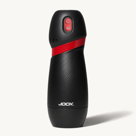Jock BLAST Sucking & Vibrating Masturbator in black with red accents, designed for hands-free suction and deep vibration.