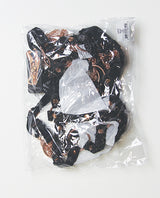 Coquette Your Command Harness Teddy Black Rose Gold in clear packaging with black straps and rose gold hardware.