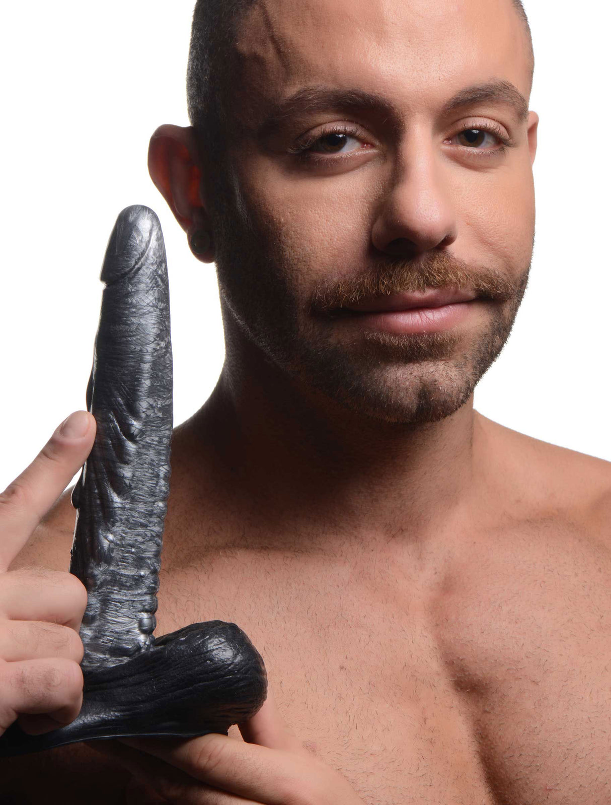 A model holding The Gargoyle Rock Hard Silicone Dildo Silver, showcasing its unique design and textured features.