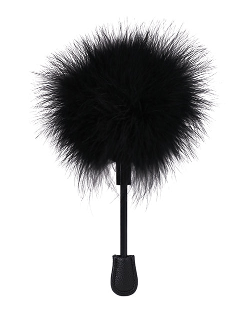 In A Bag Feather Tickler Black, a compact sensory toy with soft feathers for gentle stimulation.