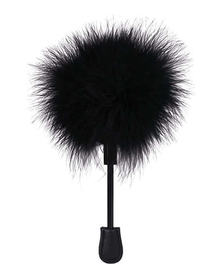 In A Bag Feather Tickler Black, a compact sensory toy with soft feathers for gentle stimulation.