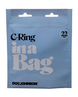 In A Bag Silicone Cock Ring Black packaging from Doc Johnson, featuring a blue bag with product details.