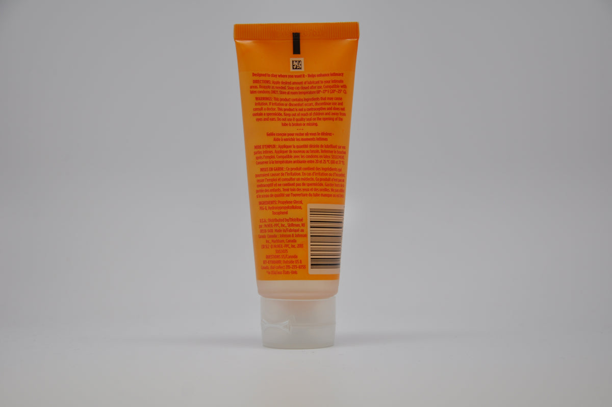 Ky Warming Jelly 2.5 Oz Water-Based Lubricant tube with instructions on a plain background.