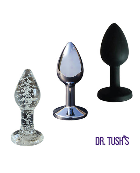 Dr Tush's First Step Anal Plug Set Glass Metal Silicone featuring three anal plugs in various materials and textures.
