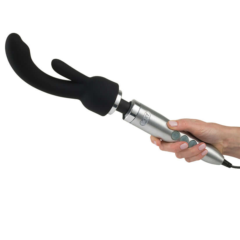 Doxy Rabbit G-spot Wand Attachment held in hand, featuring a silver wand with a black rabbit-shaped attachment.