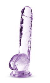 Naturally Yours 8 Inch Crystalline Dildo Amethyst in translucent purple color with suction cup base for hands-free play.