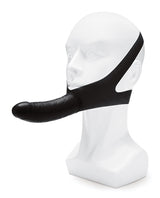 Lux Fetish The Original Facilitator Face Strap-On Black displayed on a head model for hands-free enjoyment.
