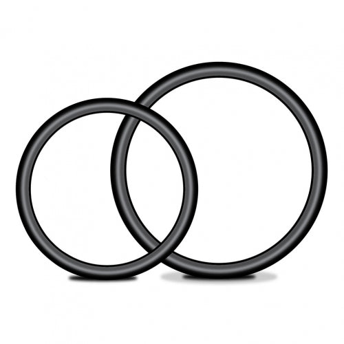 Lux Fetish Strap On Harness 5 Inch Dildo Set includes two black rings for enhanced pleasure.