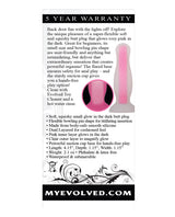 Evolved Luminous Glow Butt Plug Small Pink product details and features on a warranty card.
