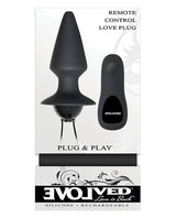Evolved Plug & Play Remote Anal Plug Black packaging with remote control and silicone design.