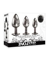 Evolved Gem Black Metal Anal Plug Set - three graduated plugs in packaging, showcasing stylish black gem bases.