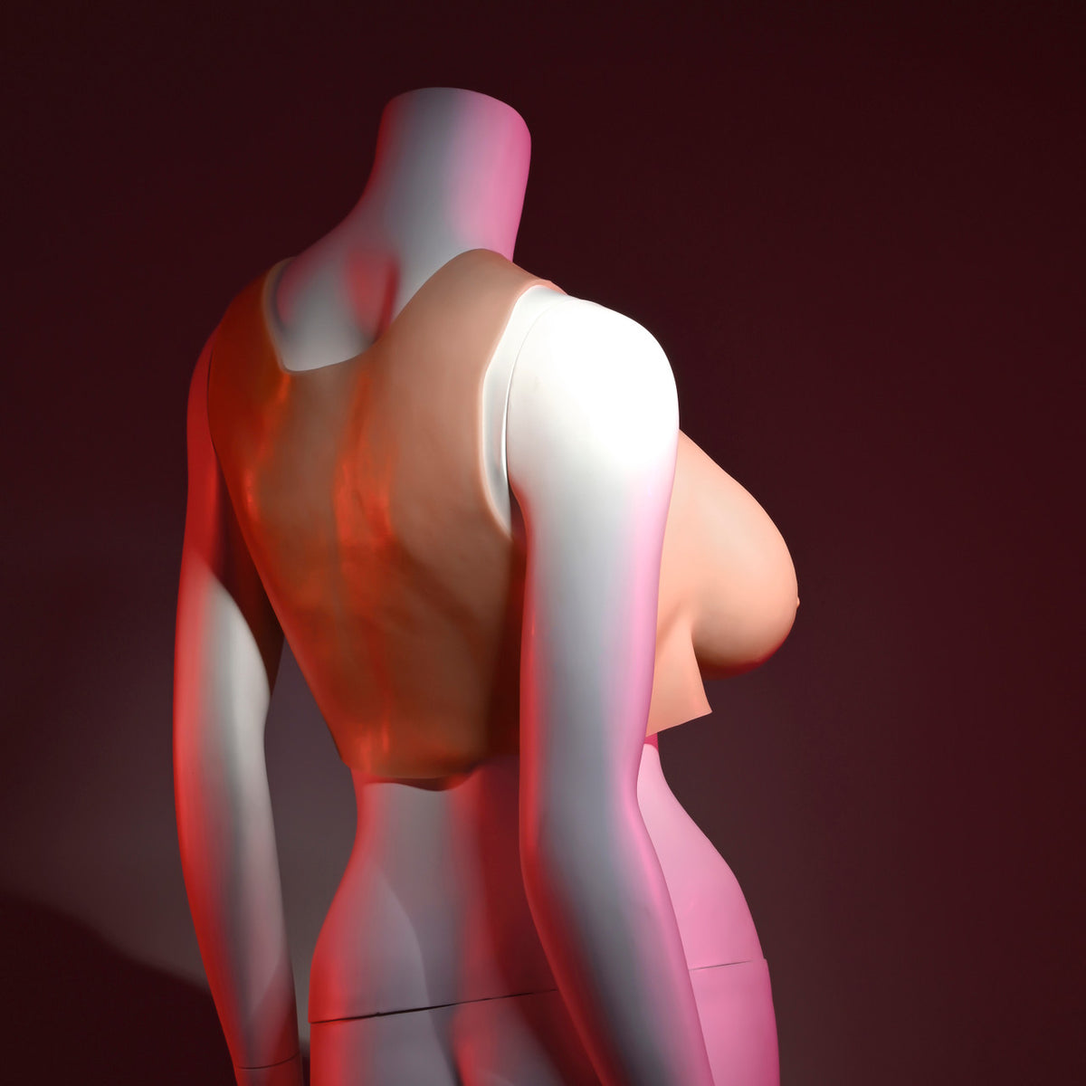 Gender X Undergarments D-Cup Silicone Breast Plate Light showcased on a mannequin, highlighting realistic shape and comfort.
