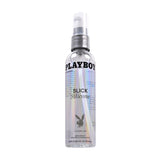 Playboy Pleasure Slick Silicone Lubricant 4 Oz bottle with a spray nozzle and iridescent design.