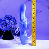 Evolved Butterfly Dreams Silicone Rabbit Vibrator displayed with measurement ruler, showcasing its soft silicone design and butterfly features.