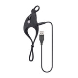 Zero Tolerance Saddle Up Vibrating Cock Ring in black with USB charging cable for enhanced intimacy.