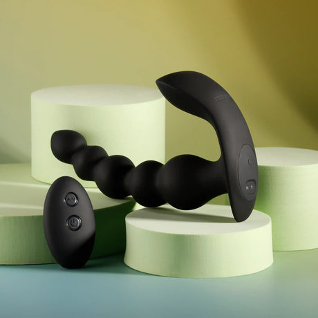 Evolved Bead Me Up Silicone Vibrating Anal Beads Black on light green background with control buttons.