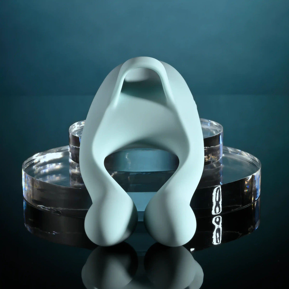 Evolved Couples Therapy Silicone Vibrator Green showcasing the unique design with two vibrating antennae.