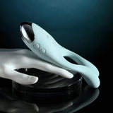 Evolved Couples Therapy Silicone Vibrator Green displayed on a hand with a sleek design and dual vibrating antennae.