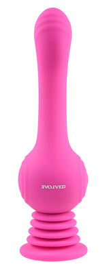 Gyro Vibe Silicone Suction Cup Vibrator Pink showcasing its textured shaft and springy suction base for ultimate pleasure.