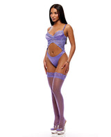 Forplay See It Through Guipure Teddy Set & Stockings Purple XL on a model showcasing elegant lingerie and thigh-high stockings.