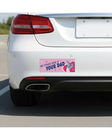 Sleazy Greetings Other Ride Is Your Dad Car Magnet displayed on a car bumper in a parking lot.