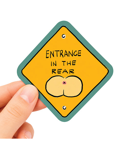 Entrance In The Rear Funny Vinyl Sticker being held, featuring a humorous design with playful imagery.