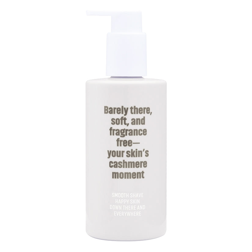 Coochy Shave Cream Au Natural 8 Oz in a pump bottle, promoting a smooth and irritation-free shave.