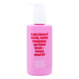 Coochy Shave Cream Berry Bliss 8 Oz in a pink bottle, featuring a blend of berries and florals for a smooth shave.