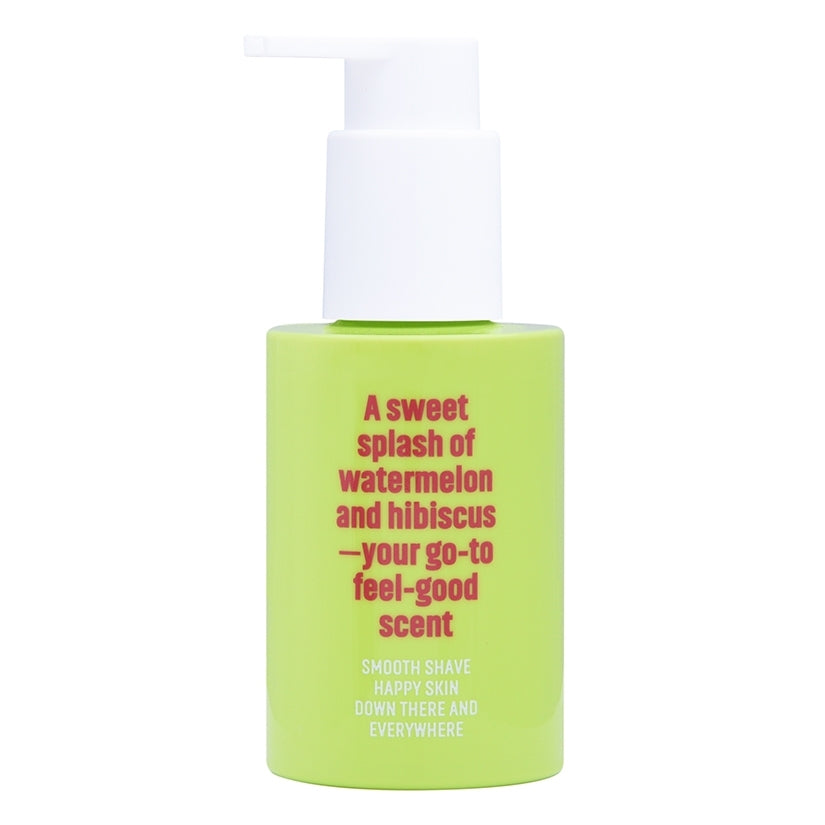 Coochy Shave Cream Melon Madness 3.4 Oz in a vibrant green bottle, featuring watermelon and hibiscus scent.
