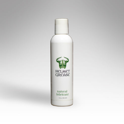 Helmet Grease Natural Lube 3.4 Ounce bottle, a natural lubricant for personal use.