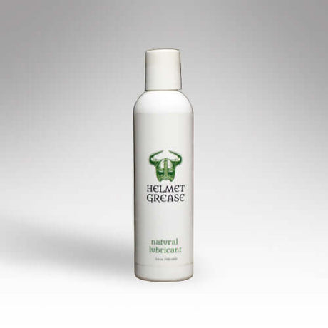 Helmet Grease Natural Lube 3.4 Ounce bottle, a natural lubricant for personal use.