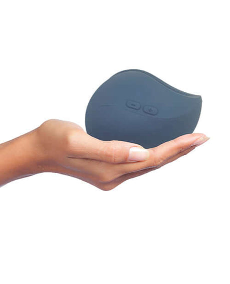 Hot Octopuss Pulse Duo Couples Massager Blue in a hand, showcasing its ergonomic design and user-friendly controls.