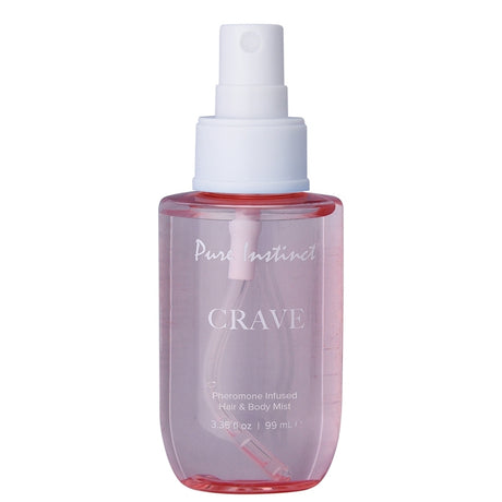 Pure Instinct Pheromone Hair & Body Mist Crave 3.35 Oz bottle in a clear design with a pink hue.
