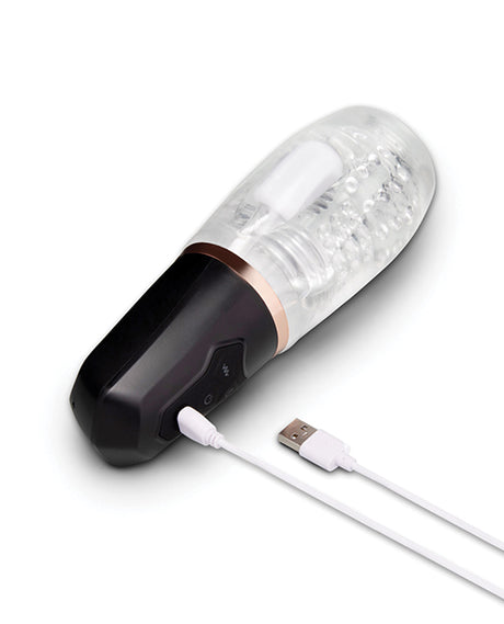 He-Vibe Vibrating Suck Master Male Masturbator with USB charging cable and textured sleeve.