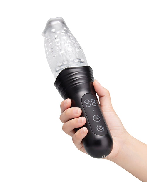 He-Vibe The Original Gluk Gulk Thrusting Oral Masturbator held in hand, showcasing its realistic design and controls.