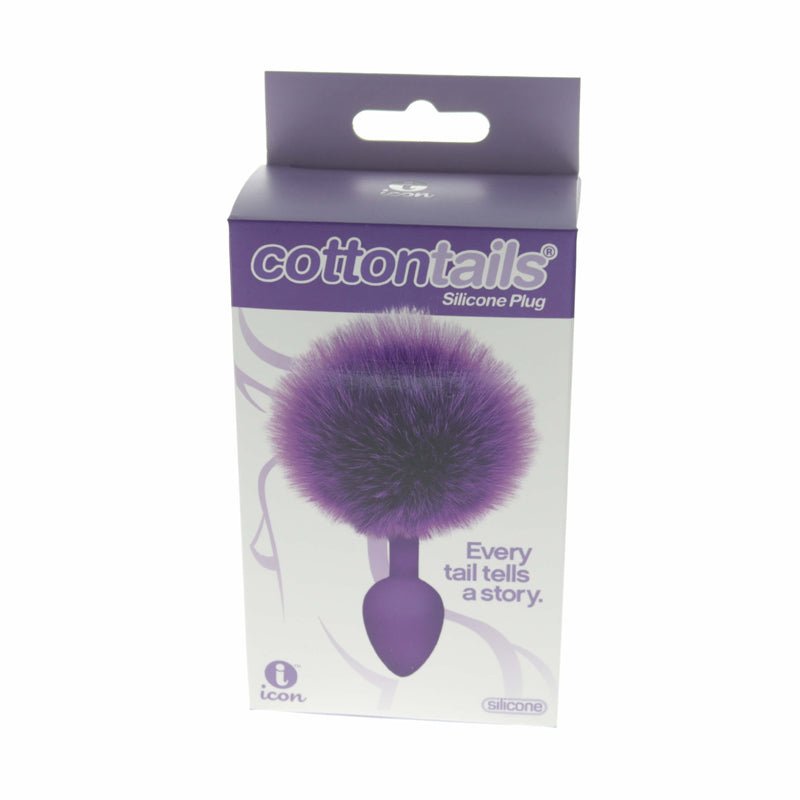 The 9's Cottontails Silicone Bunny Tail Butt Plug Purple packaging with fluffy purple tail design.