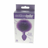The 9's Cottontails Silicone Bunny Tail Butt Plug Purple packaging with fluffy purple tail design.