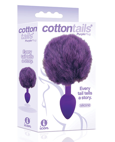 The 9's Cottontails Silicone Bunny Tail Butt Plug Purple packaged with fluffy tail, perfect for playful anal stimulation.